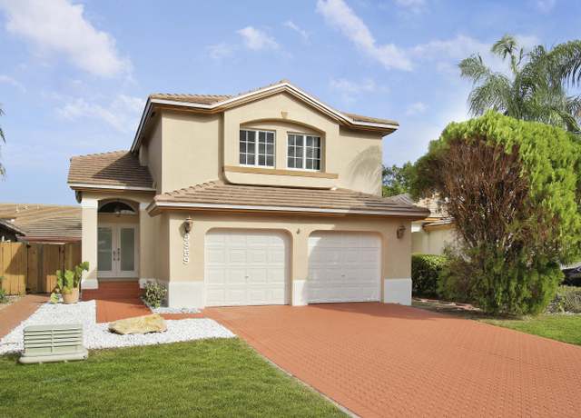 Property at 9959 NW 29th St, Doral, FL 33172, 3 beds, 2.5 baths