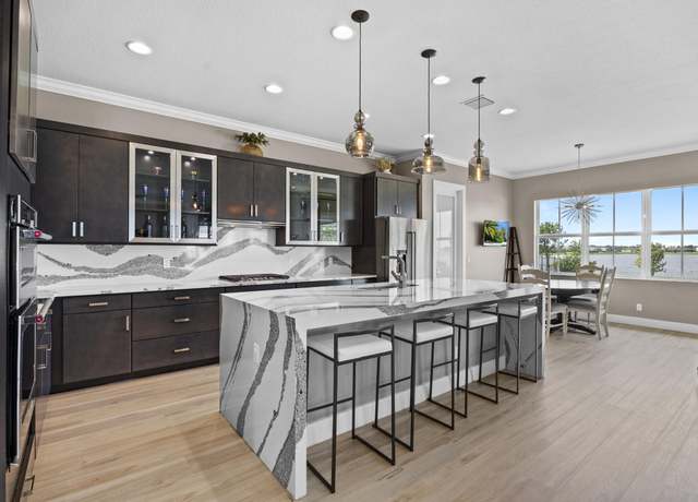 Property at 953 Hookline Cir, Loxahatchee, FL 33470, 5 beds, 4.5 baths