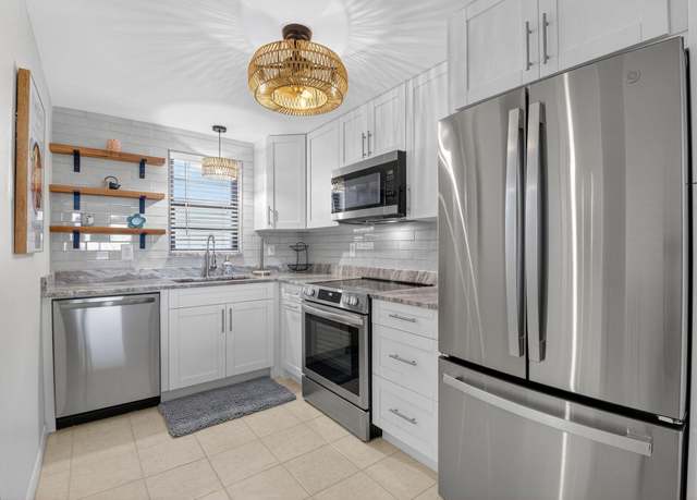 Property at 2430 Deer Creek Country Club Blvd Unit 701-2, Deerfield Beach, FL 33442, 3 beds, 2 baths