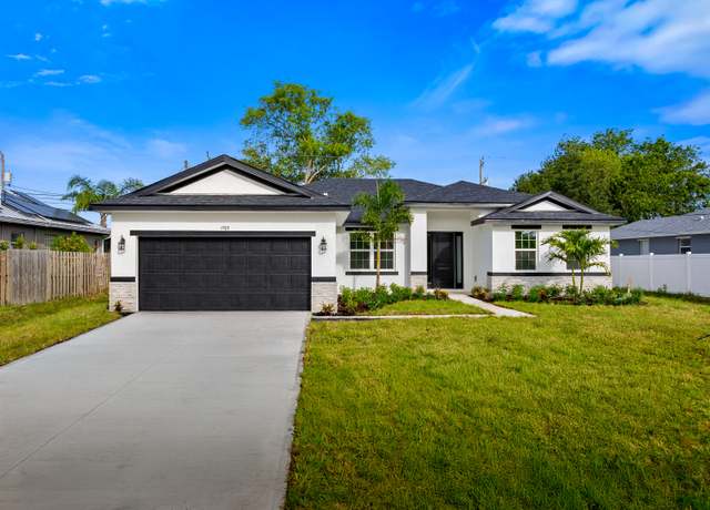 Property at 1765 SW Columbia St, Port Saint Lucie, FL 34987, 5 beds, 3 baths