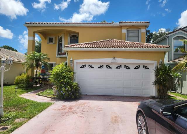 Property at 225 Maplewood Ln, Greenacres, FL 33463, 3 beds, 2.5 baths