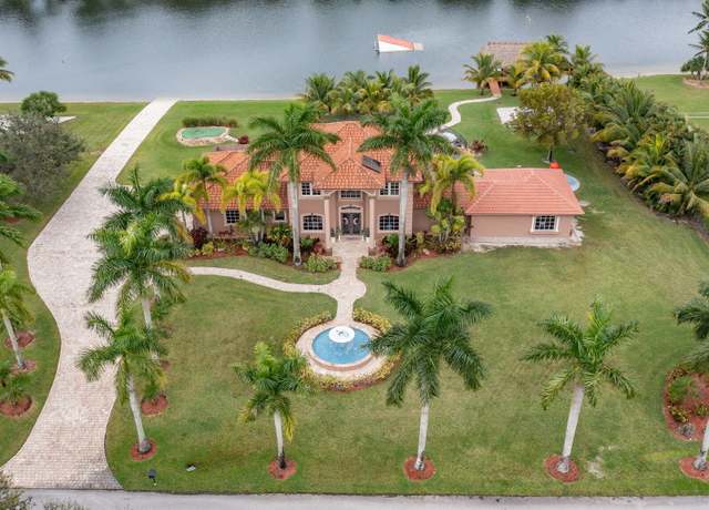 Property at 5660 Lago Del Sol Dr, Lake Worth, FL 33449, 4 beds, 4.5 baths
