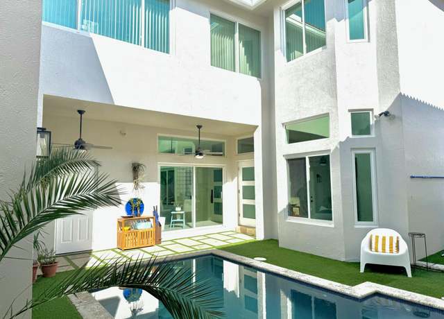 Property at 1087 Satinleaf St, Hollywood, FL 33019, 4 beds, 3.5 baths