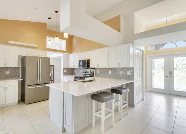 Property at 13209 Temple Blvd, West Palm Beach, FL 33412, 4 beds, 2 baths