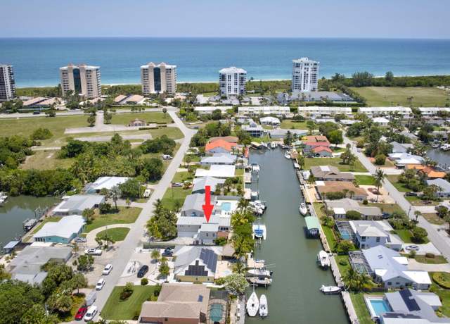 Property at 217 Marina Dr, Hutchinson Island, FL 34949, 4 beds, 3.5 baths