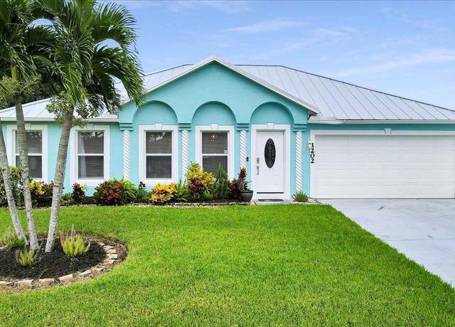 Property at 1202 SW Empire St, Port Saint Lucie, FL 34983, 4 beds, 2 baths
