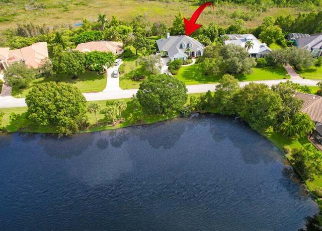 Property at 119 SW Lake Rush Ct, Palm City, FL 34990, 4 beds, 3.5 baths