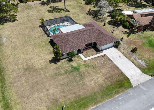 Property at 5569 SE Paramount Dr, Stuart, FL 34997, 3 beds, 2 baths