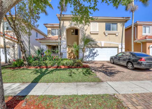 Property at 628 Gazetta Way, West Palm Beach, FL 33413, 4 beds, 2.5 baths