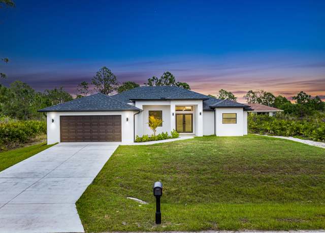 Property at 2712 40th St W, Lehigh Acres, FL 33971, 4 beds, 2.5 baths