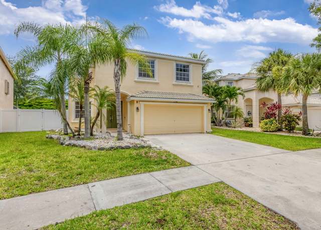 Property at 1196 Oakwater Dr, Royal Palm Beach, FL 33411, 5 beds, 2.5 baths