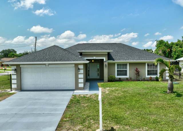 Property at 1897 SW Lofgren Ave, Port Saint Lucie, FL 34953, 4 beds, 2 baths
