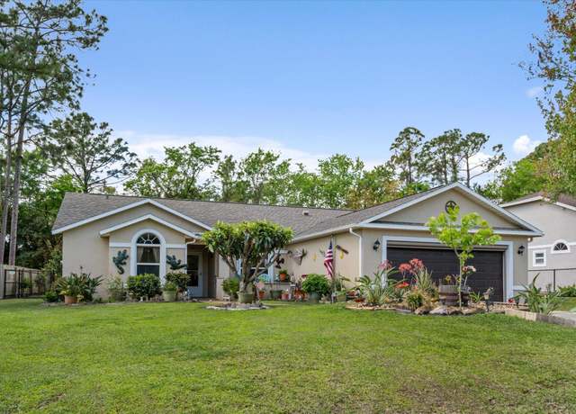 Property at 13 Putter Dr, Palm Coast, FL 32164, 3 beds, 2 baths