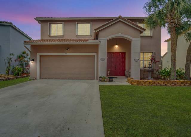 Property at 217 Seminole Lakes Dr, Royal Palm Beach, FL 33411, 4 beds, 2.5 baths