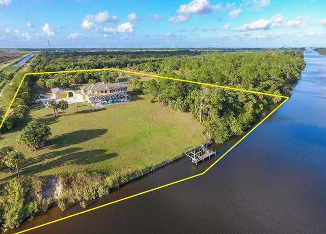 Property at 11733 SW Citrus Blvd, Palm City, FL 34990, 7 beds, 9.5 baths