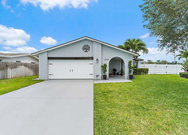 Property at 9674 Dogwood Ave, Palm Beach Gardens, FL 33410, 4 beds, 2 baths
