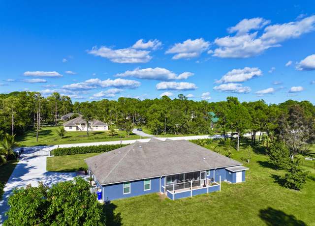Property at 16368 Murcott Blvd, Loxahatchee, FL 33470, 4 beds, 2.5 baths