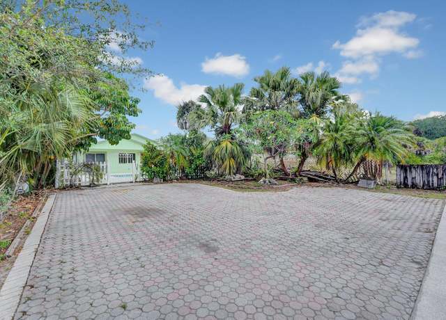 Property at 6959 Clendenin St, Lake Worth, FL 33467, 4 beds, 2 baths