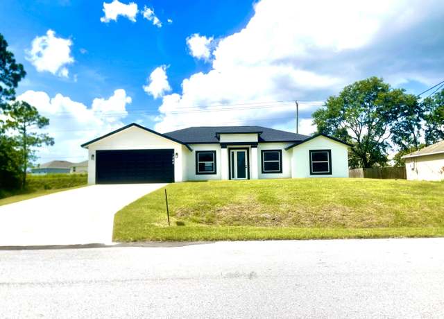 Property at 1260 Larkspur St SE, Palm Bay, FL 32909, 4 beds, 3 baths