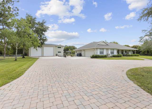Property at 14918 Tangelo Blvd, West Palm Beach, FL 33412, 3 beds, 2 baths