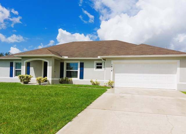 Property at 1614 SW Sylvester Ln, Port Saint Lucie, FL 34984, 4 beds, 2 baths