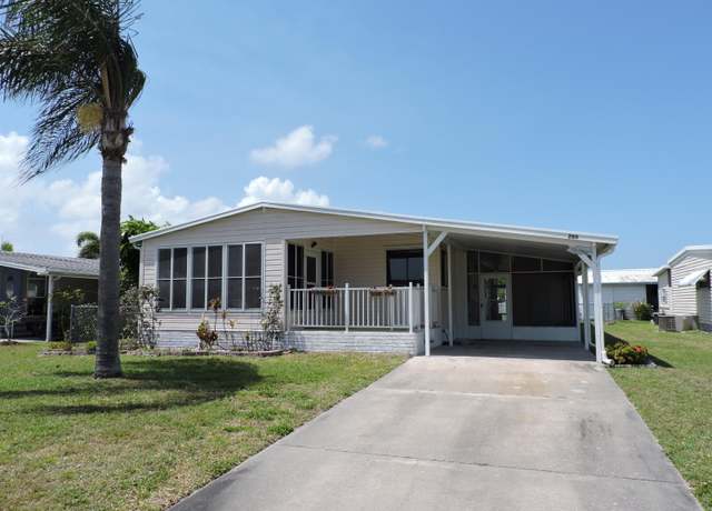 Property at 703 Draco Dr, Barefoot Bay, FL 32976, 2 beds, 2 baths