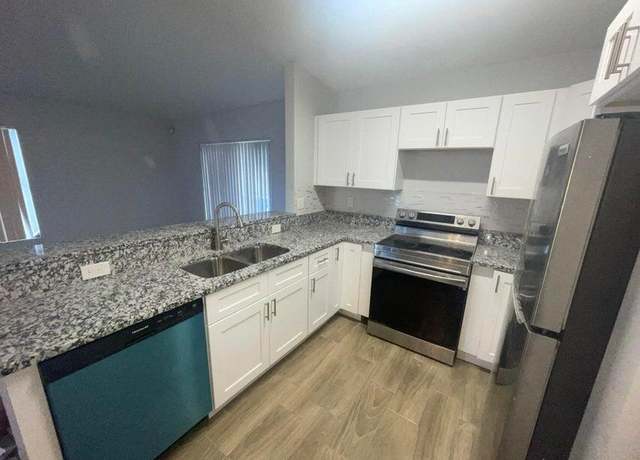 Property at 1105 W 9th St, Riviera Beach, FL 33404, 4 beds, 2 baths