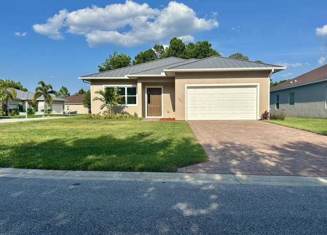 Property at 660 NE Moss Rose Pl, Port Saint Lucie, FL 34983, 3 beds, 2.5 baths