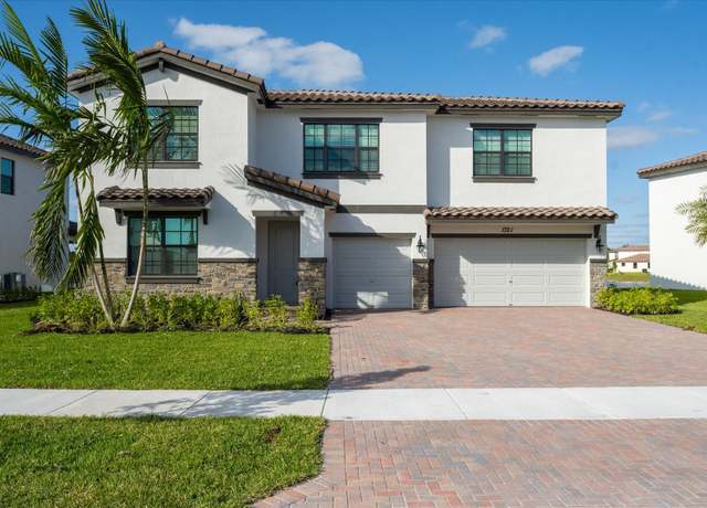 Property at 1321 Whitcombe Dr, Royal Palm Beach, FL 33411, 5 beds, 3.5 baths