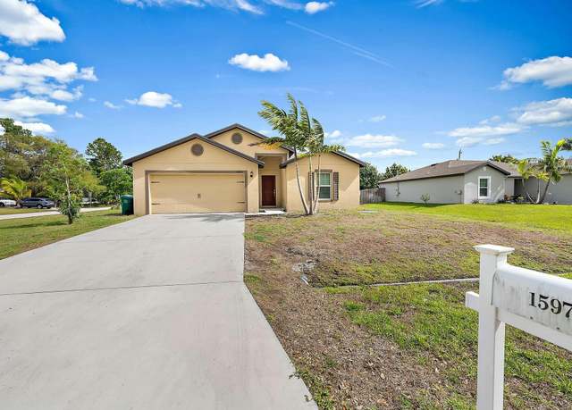 Property at 1597 SW Leisure Ln S, Port Saint Lucie, FL 34953, 5 beds, 3 baths