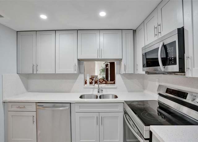 Property at 7850 W Mcnab Rd #101, Tamarac, FL 33321, 2 beds, 2 baths