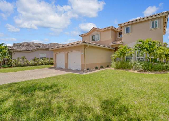 Property at 317 E Garden Cove Cir, Davie, FL 33325, 4 beds, 3 baths