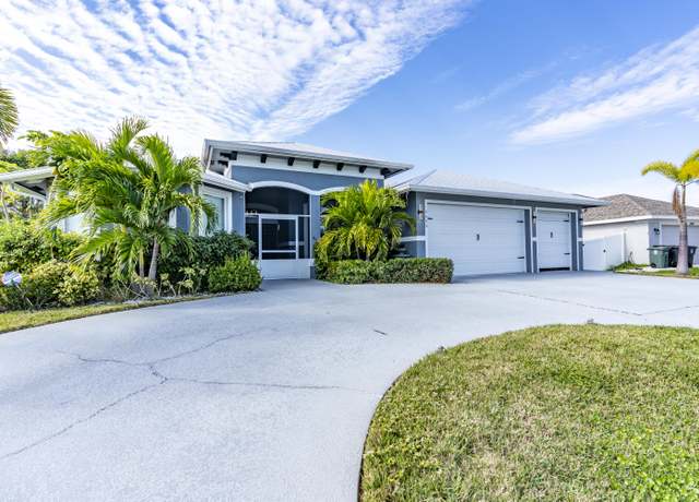 Property at 3453 SE Hart Cir, Port Saint Lucie, FL 34984, 4 beds, 3 baths
