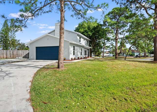Property at 1741 SW Brisbane St, Port Saint Lucie, FL 34984, 4 beds, 3.5 baths