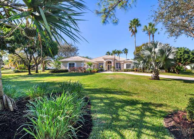 Property at 7605 Woodsmuir Dr, Palm Beach Gardens, FL 33412, 4 beds, 4 baths