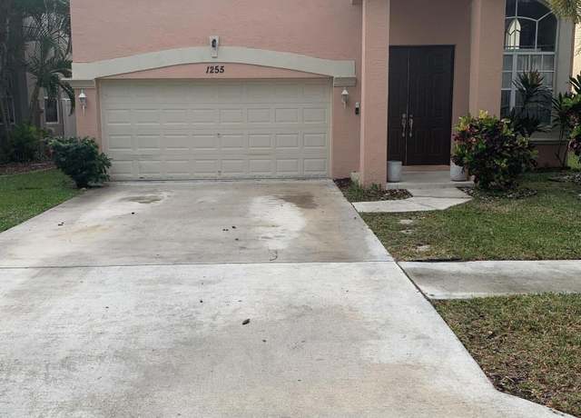 Property at 1255 Oakwater Dr, Royal Palm Beach, FL 33411, 4 beds, 3 baths