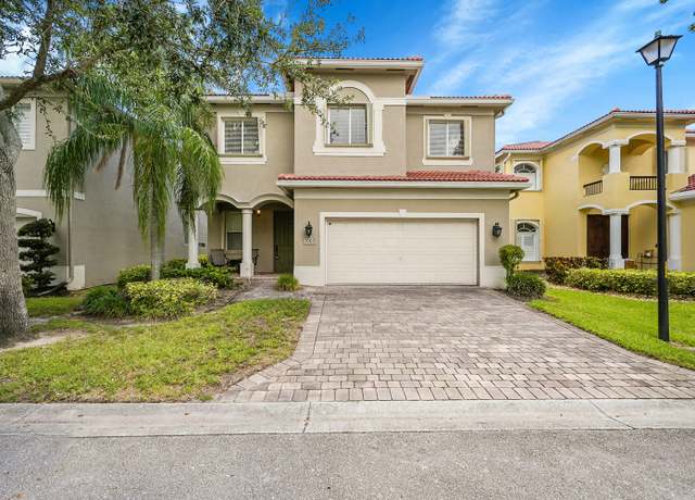 Property at 1002 Center Stone Ln, Riviera Beach, FL 33404, 5 beds, 3.5 baths