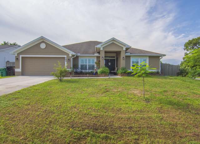 Property at 702 SE Walters Ter, Port Saint Lucie, FL 34983, 4 beds, 3 baths