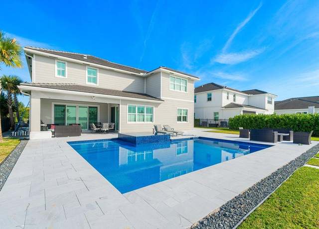 Property at 983 Hookline Cir, The Acreage, FL 33470, 5 beds, 4.5 baths