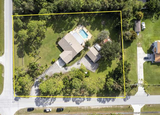 Property at 14534 Key Lime Blvd, The Acreage, FL 33470, 4 beds, 2 baths