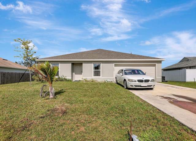 Property at 1557 SW Flagami Rd, Port Saint Lucie, FL 34953, 3 beds, 2 baths