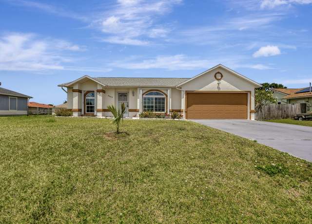 Property at 5489 NW Evanston Ave, Port Saint Lucie, FL 34983, 3 beds, 2 baths