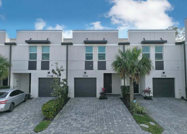 Property at 1712 Lindley St, Mangonia Park, FL 33407, 3 beds, 2.5 baths