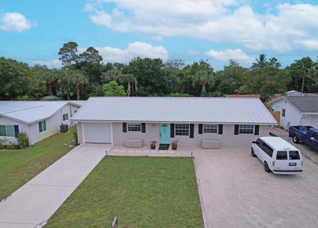 Property at 8744 SE Jardin St, Hobe Sound, FL 33455, 4 beds, 2 baths