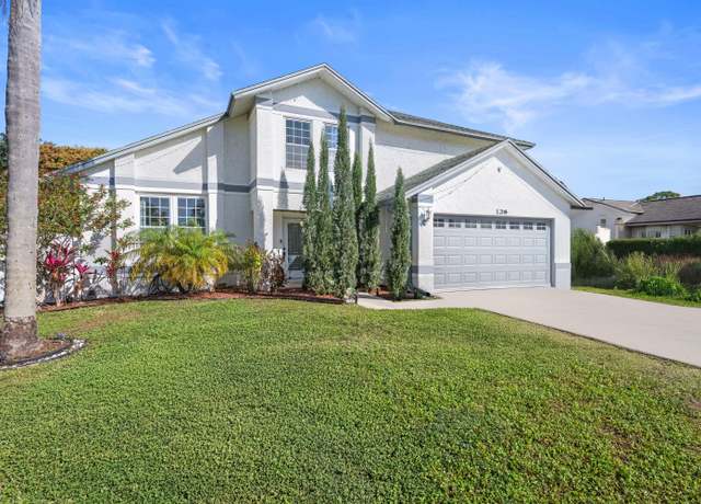 Property at 128 Royal Pine Cir N, Royal Palm Beach, FL 33411, 4 beds, 2.5 baths