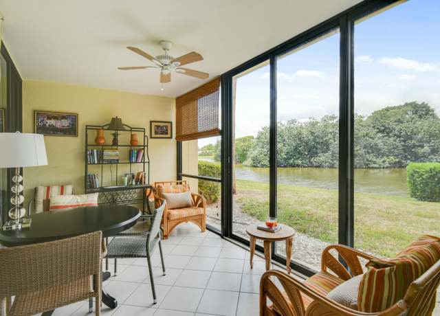 Property at 5250 Woodland Lakes Dr #128, Palm Beach Gardens, FL 33418, 2 beds, 2 baths