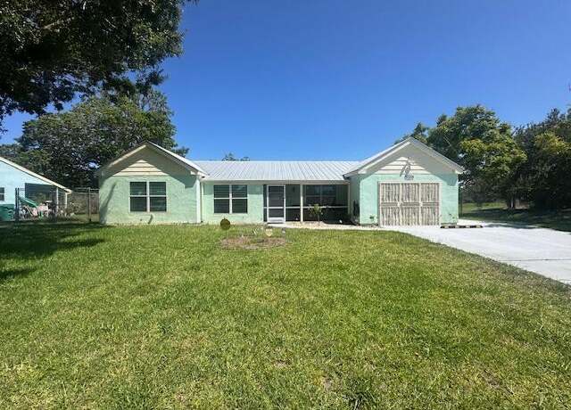 Property at 1910 SE Rainier Rd, Port Saint Lucie, FL 34952, 3 beds, 3 baths