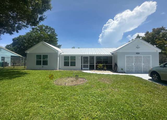 Property at 1910 SE Rainier Rd, Port Saint Lucie, FL 34952, 3 beds, 3 baths