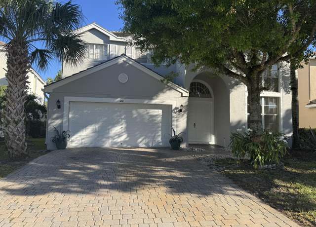 Property at 104 Kensington Way, Royal Palm Beach, FL 33414, 4 beds, 3 baths