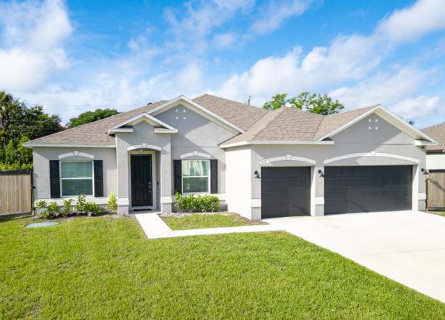 Property at 652 SW Mccoy Avenue Ave, Port Saint Lucie, FL 34953, 4 beds, 3 baths